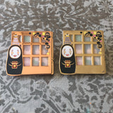 A Peek into Worlds Enamel Pins