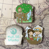 A Peek into Worlds Enamel Pins